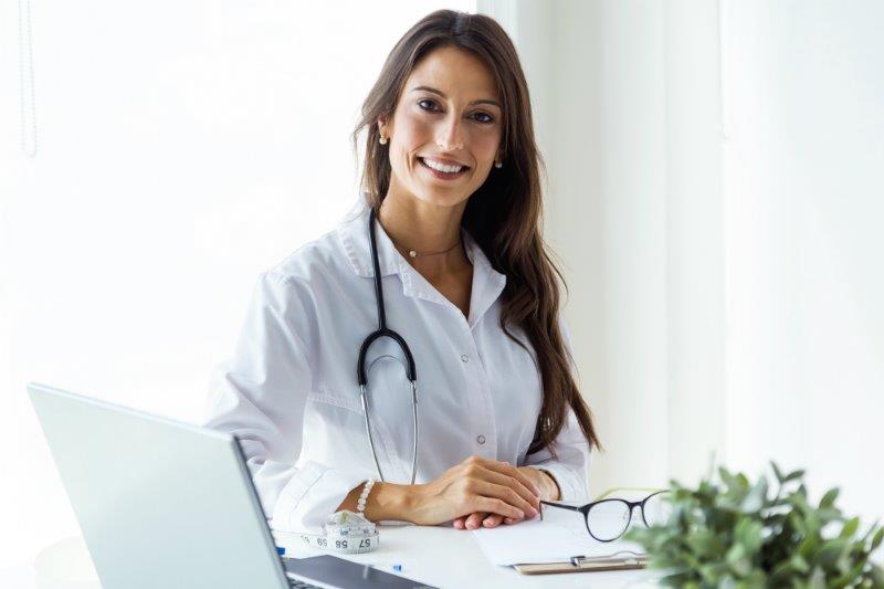 A doctor in her office